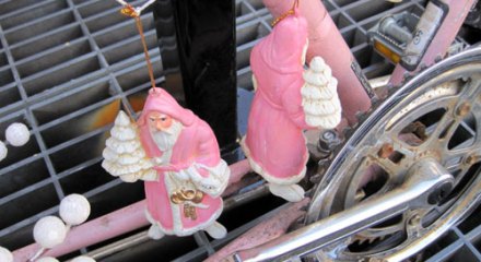 Bike with pink Santas and cranberries