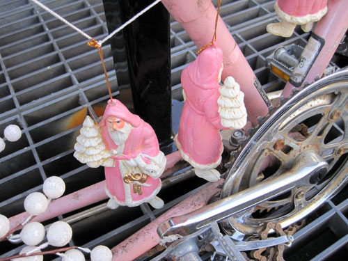 Bike with pink Santas and cranberries