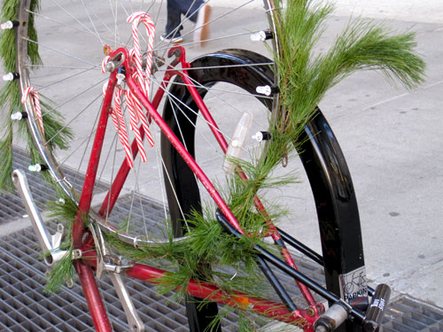 Bike decorated with wreath, candycanes & manifesto