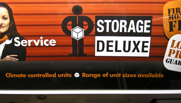 Storage Deluxe logo = SNL d*ck in a box